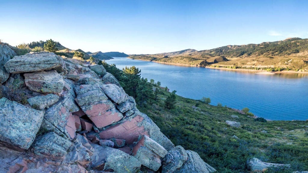 Horsetooth Reservoir // Discover the best places to SUP in Colorado this summer with the best Rocky Mountain views, calm waters, and quiet solitude.