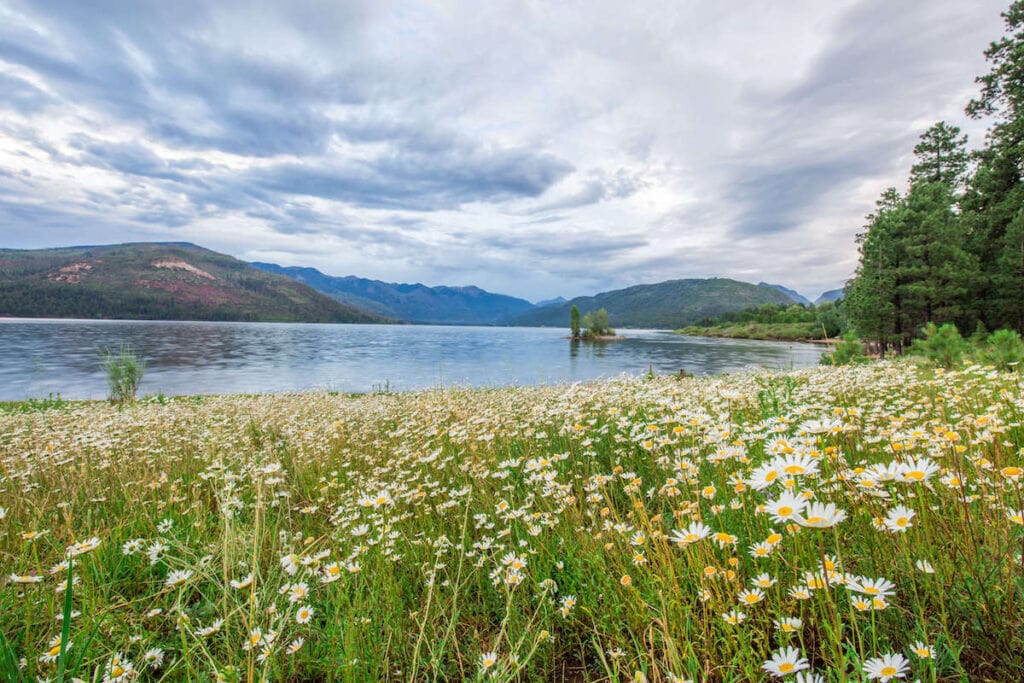 Vallecito Lake // Discover the best places to SUP in Colorado this summer with the best Rocky Mountain views, calm waters, and quiet solitude.